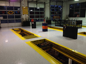 An example of Ed's Amazing Garage Flooring' work for an auto garage.